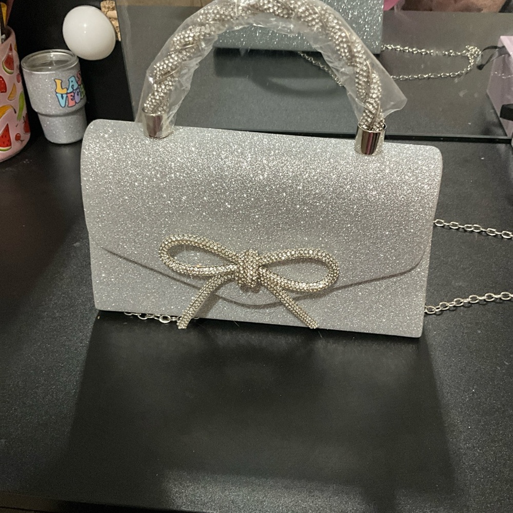 Elegant Silver Handbag with Bow Accent